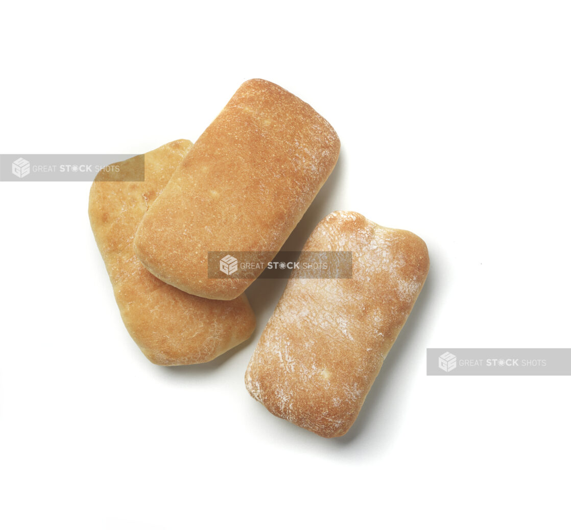 Whole ciabatta buns on a white background