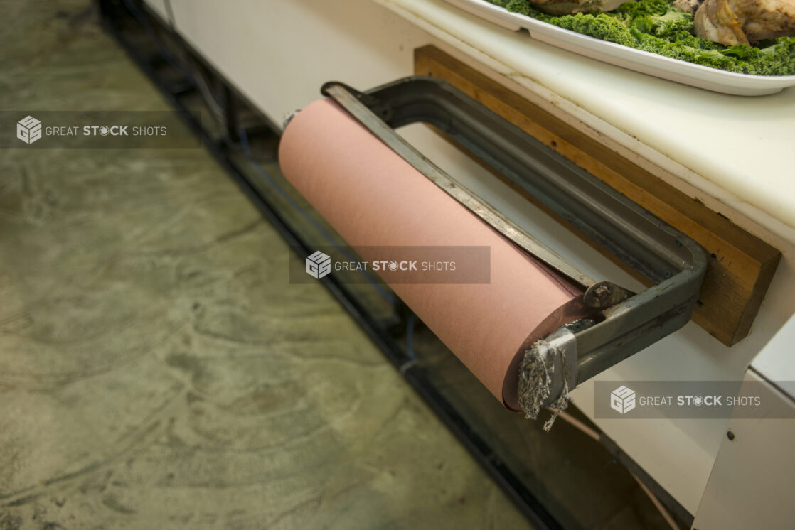 Roll of butcher paper behind the counter in a butchery