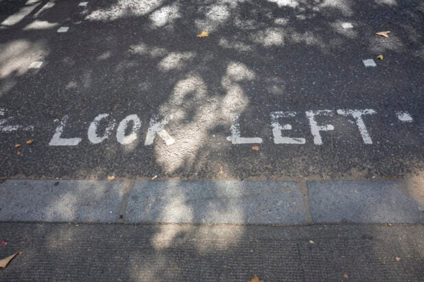 "Look Left" sign on the ground in London, England