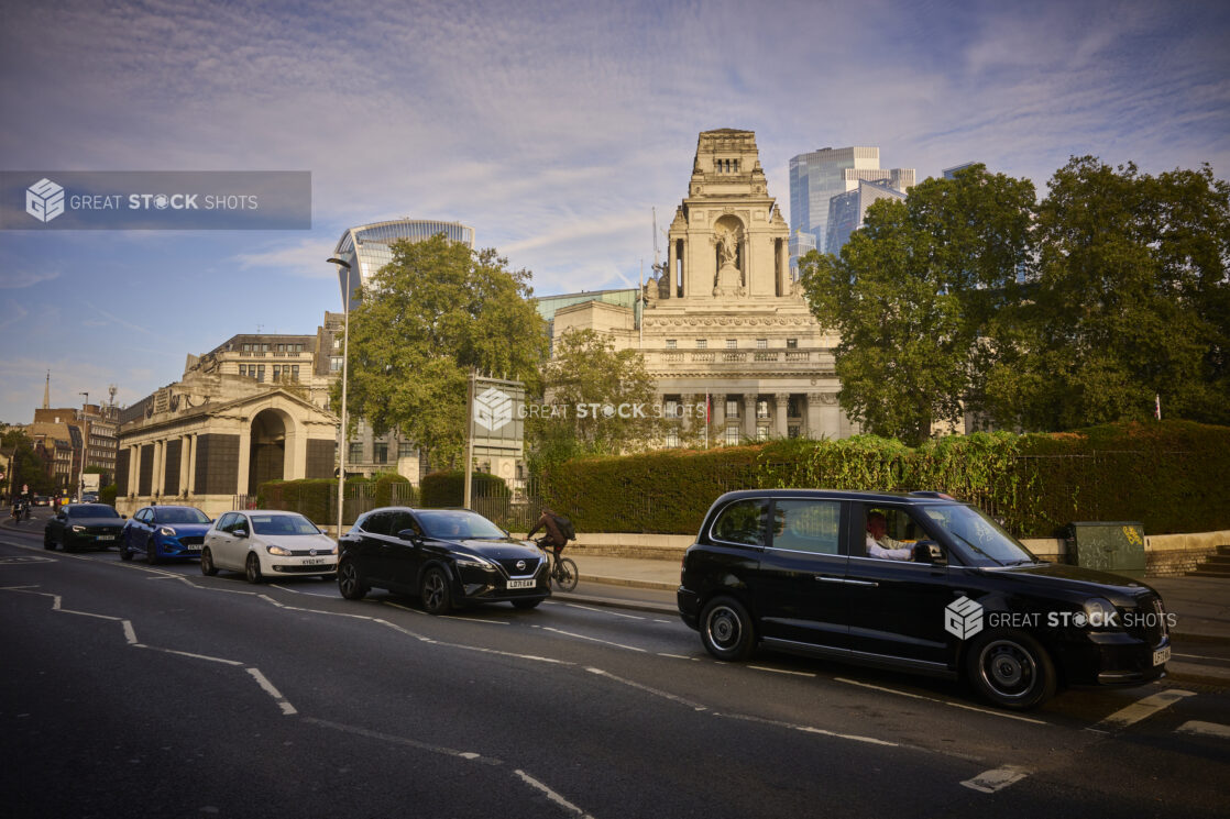 Tower Hill Station, London, England, UK, street view with taxi and cars, old buildings