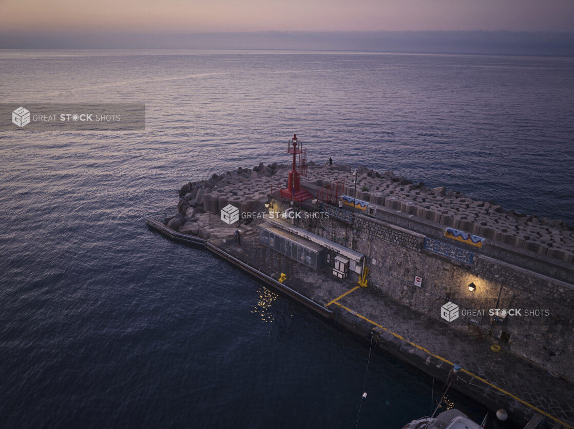 Harbour breakwall on the Mediterranean Sea in Italy