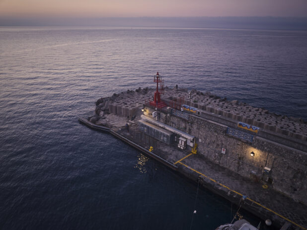 Harbour breakwall on the Mediterranean Sea in Italy