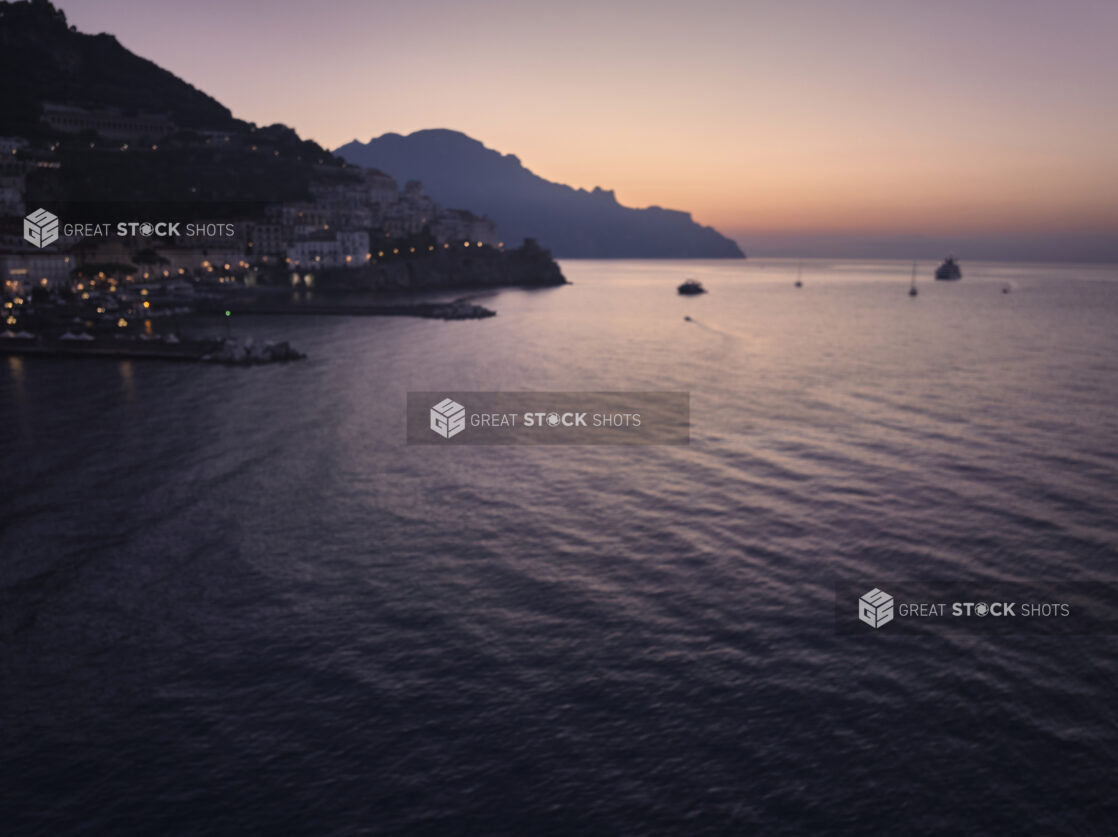 Sunrise/sunset view of an Italian coastal town and shoreline