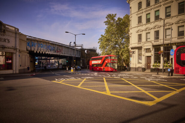 Wide shot cityscape photo of London with Double Decker Bus in background