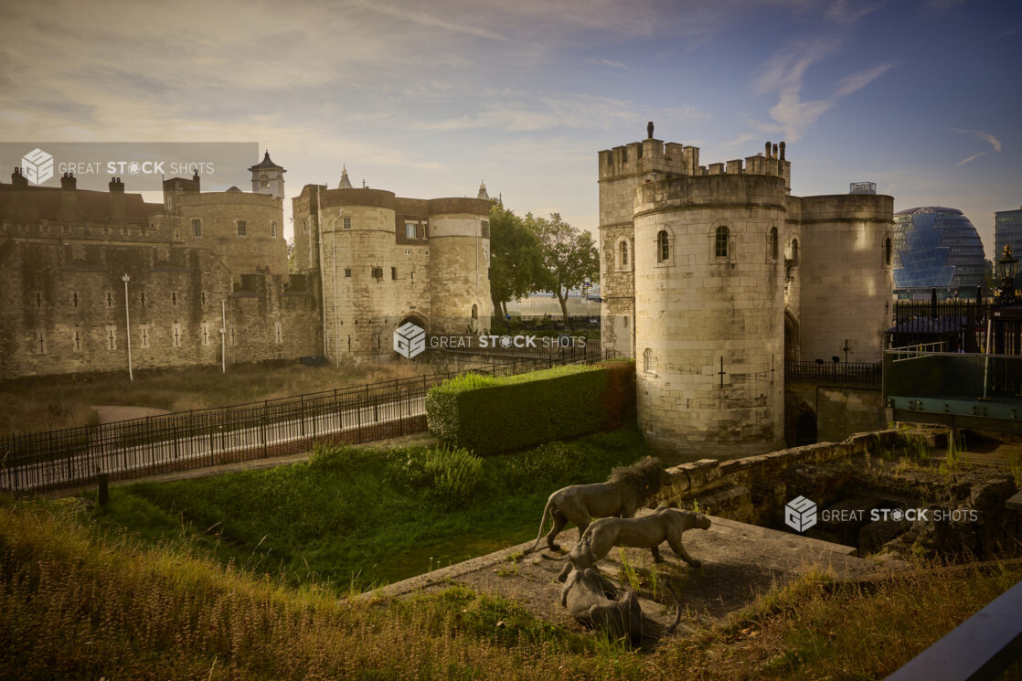 View of the Tower of London Royal Menagerie Area with Fine Wire Lion Statues at Sunset in London, England