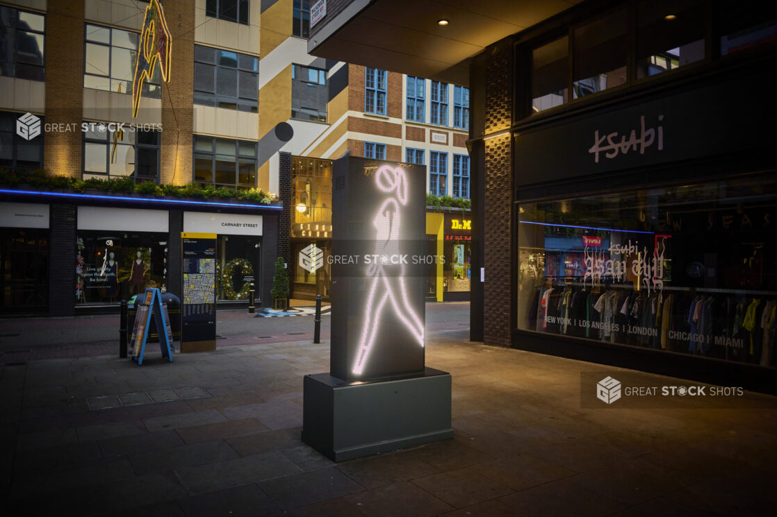 Evening View of Carnaby Street Shopping District with an Interactive Video Display Art Installation