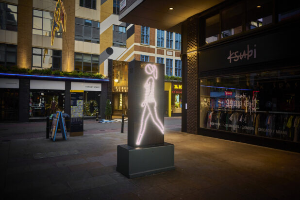 Evening View of Carnaby Street Shopping District with an Interactive Video Display Art Installation