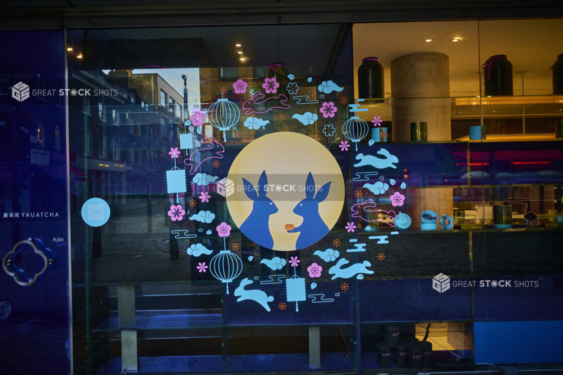 Window view of a restaurant with a Mid Autumn Festival motif on the window in London, England