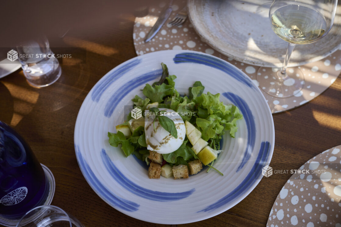 Burrata on Fresh Salad with Lemon and Croutons