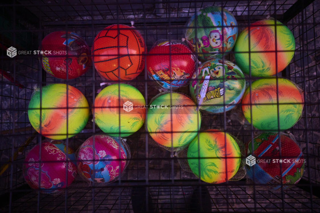 Colourful Children's Bouncy Balls in a Cage