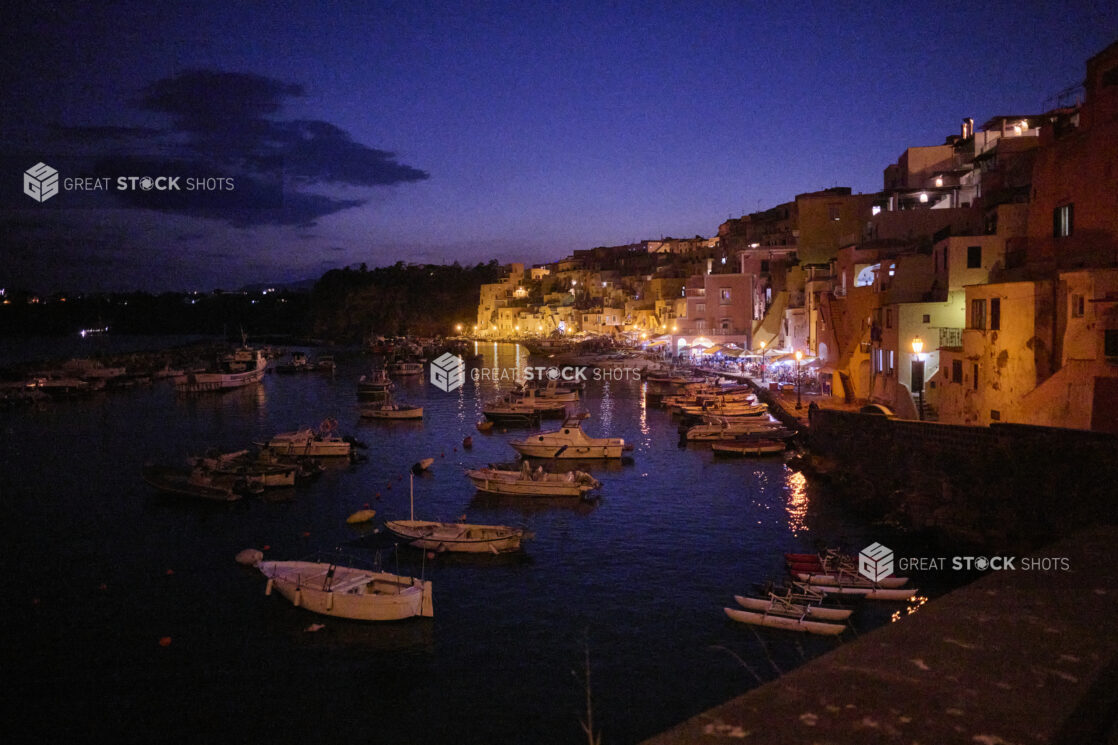 Stunning view of an Italian coastline and marina at dusk