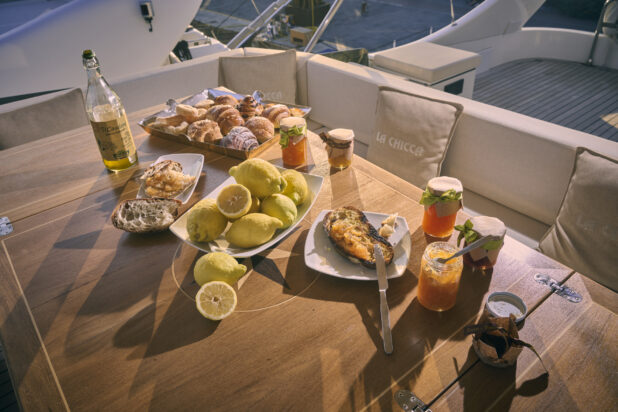 Breakfast or Brunch under the morning sun on a Yacht on the Italian coast