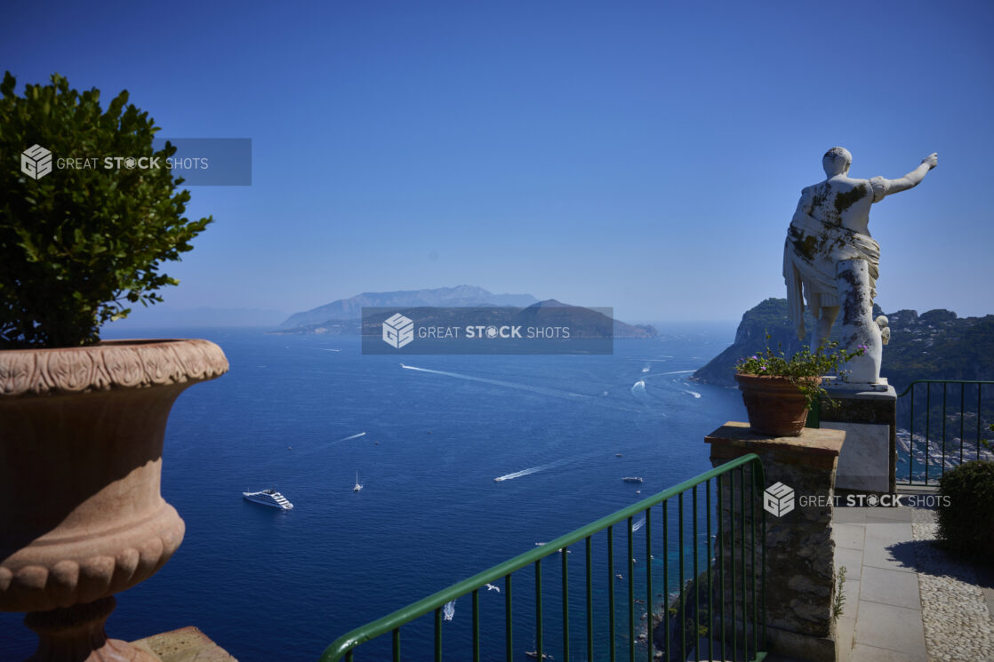 Outdoor Terrace with statue of Caesar Augustus overlooking Italian Coast in Capri