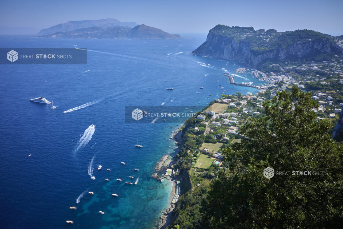 Birds Eye View of Italian Coastline and Marina with Beach Resorts and Boats, Yachts and Emerald and Blue Ocean Water and Cliffs in Background