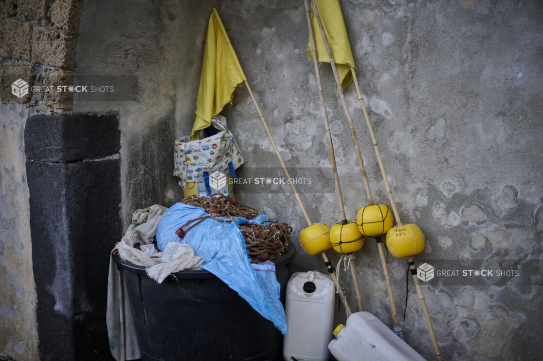 Fishing gear against a wall in Italy