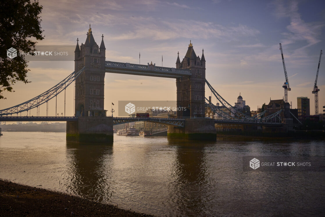 View of Tower Bridge, London, England at dusk on the Thames River