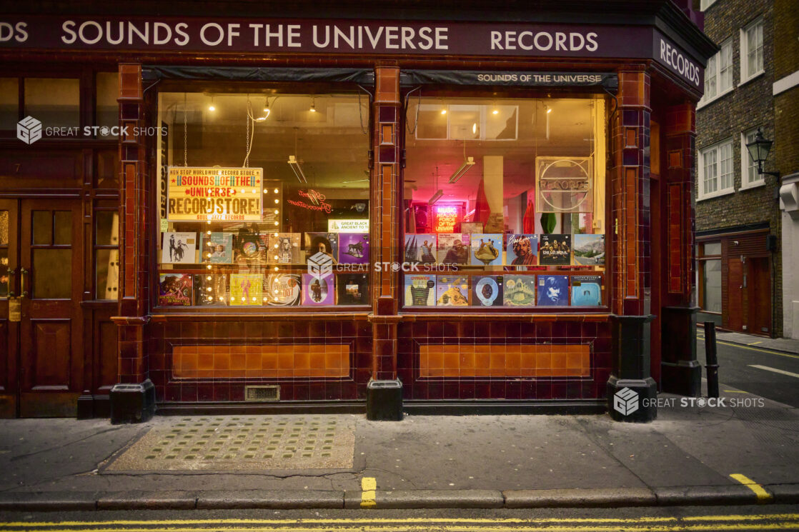 Storefront view of a record shop on a street corner in London, England,