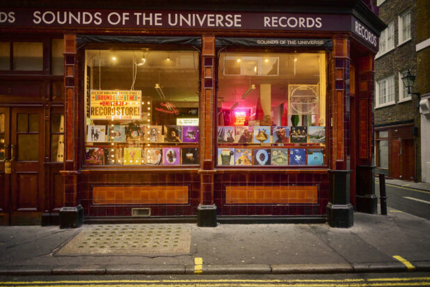 Storefront view of a record shop on a street corner in London, England,