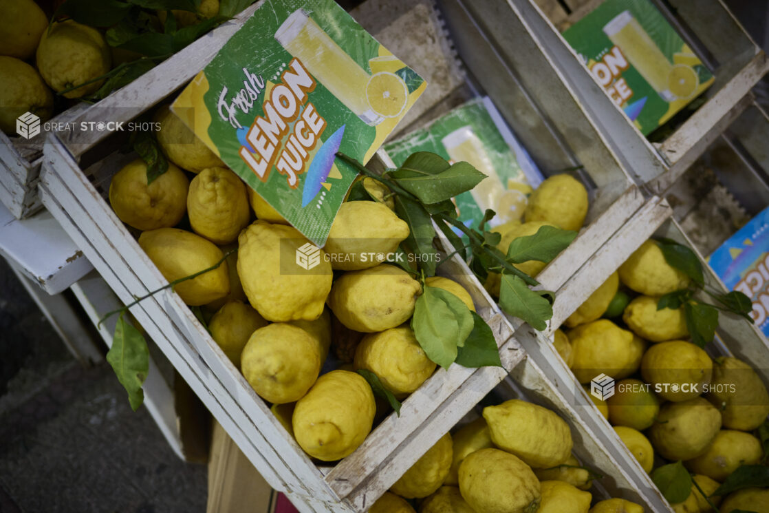 Overhead view of lemons in wooden crates