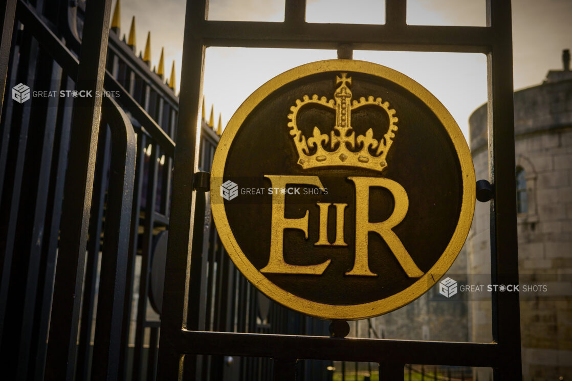 Elizabeth II insignia on the gates to the Tower of London, London, England