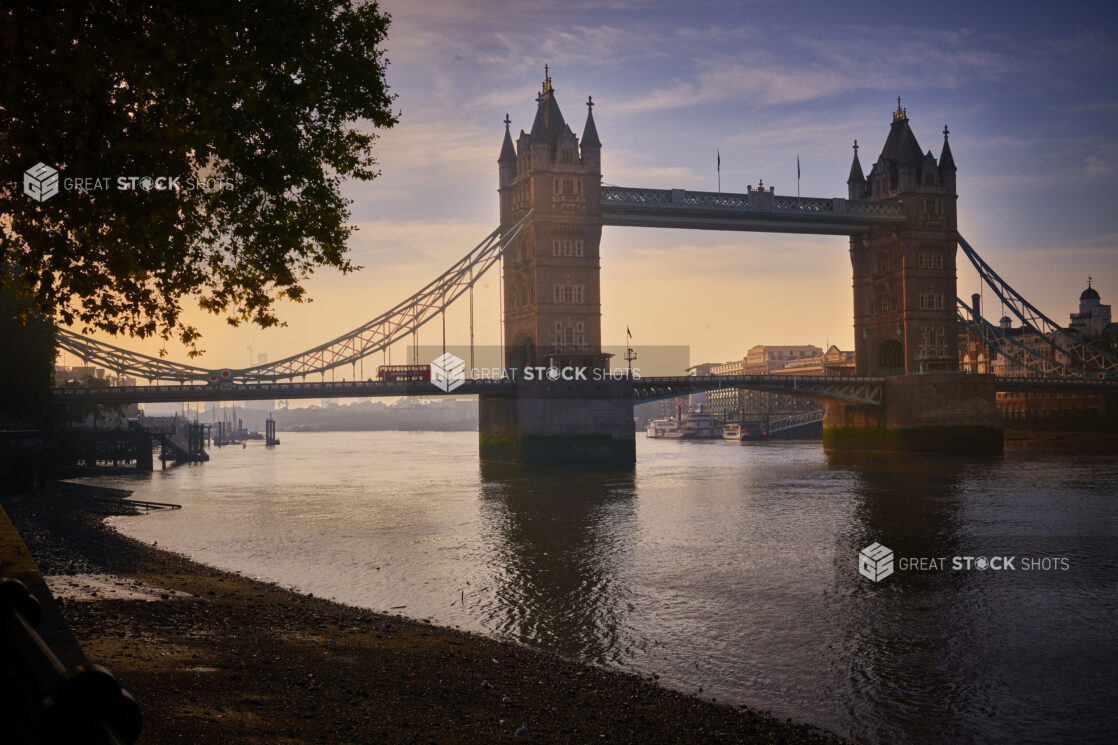 View of Tower Bridge, London, England at dusk on the Thames River