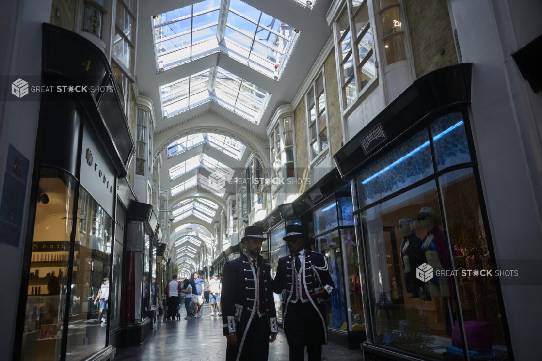 Uniformed Beadles Standing Under the Skylit Corridor of the Burlington Arcade Covered Shopping Area in London, England