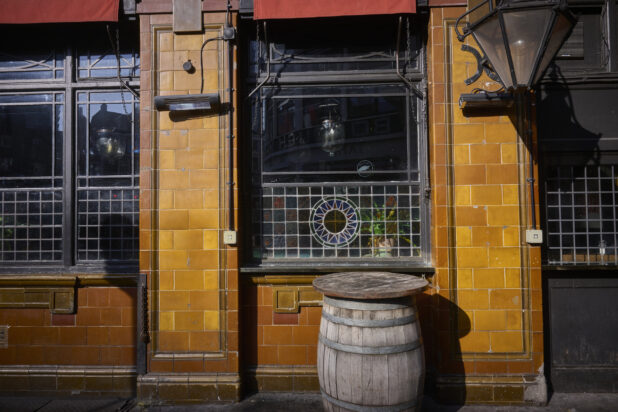 Whiskey Barrel outside a Pub at Night in London, England