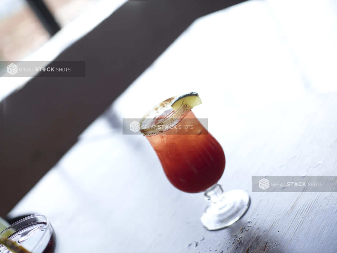 Bloody Mary Cocktail Close Up on Restaurant Table Setting