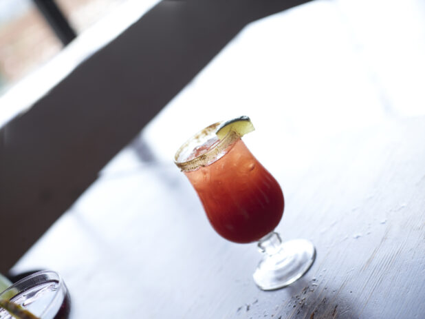 Bloody Mary Cocktail Close Up on Restaurant Table Setting