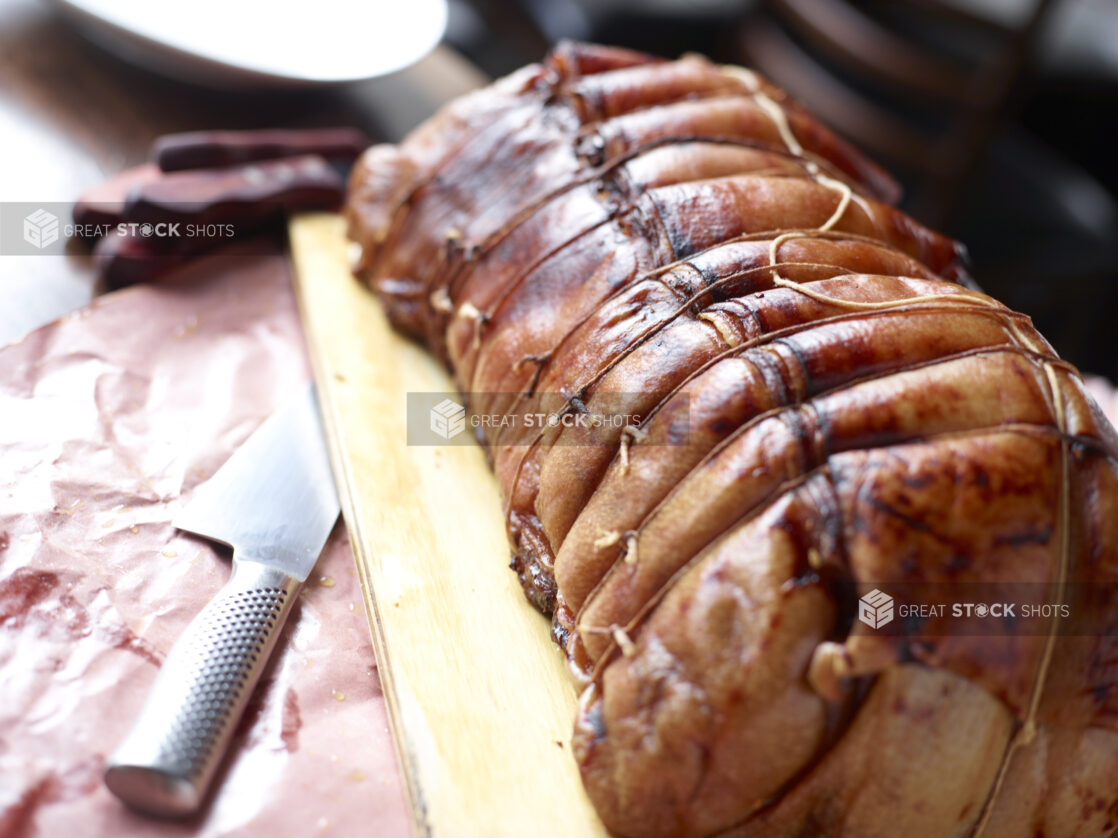 Whole Porchetta Roast on Carving Board