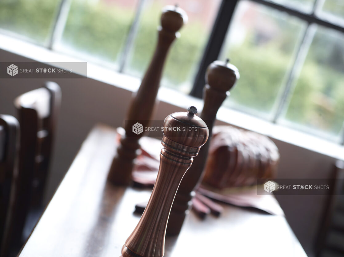 Pepper Mills on Restaurant Table Setting