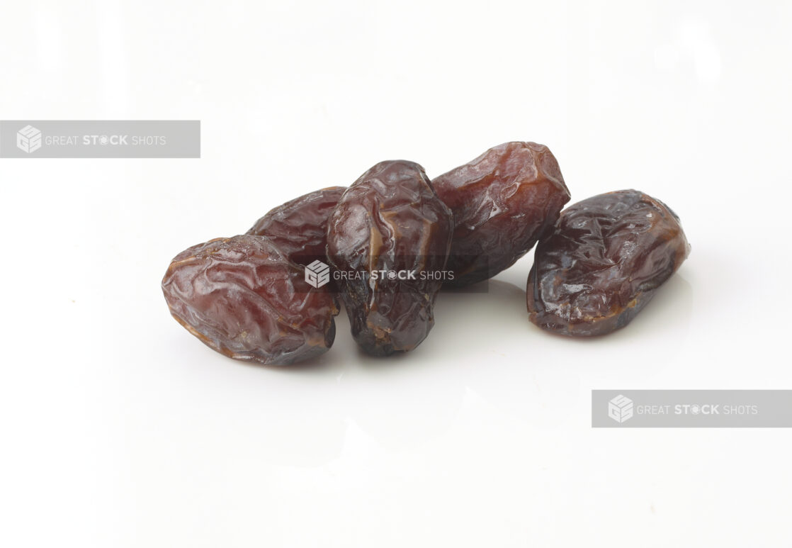 Whole dates in a grouping on a white background