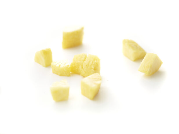 Chunks of Fresh Cut Pineapple Pieces Shot on White for Isolation