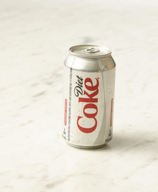 A can of Diet Coke on a marble background