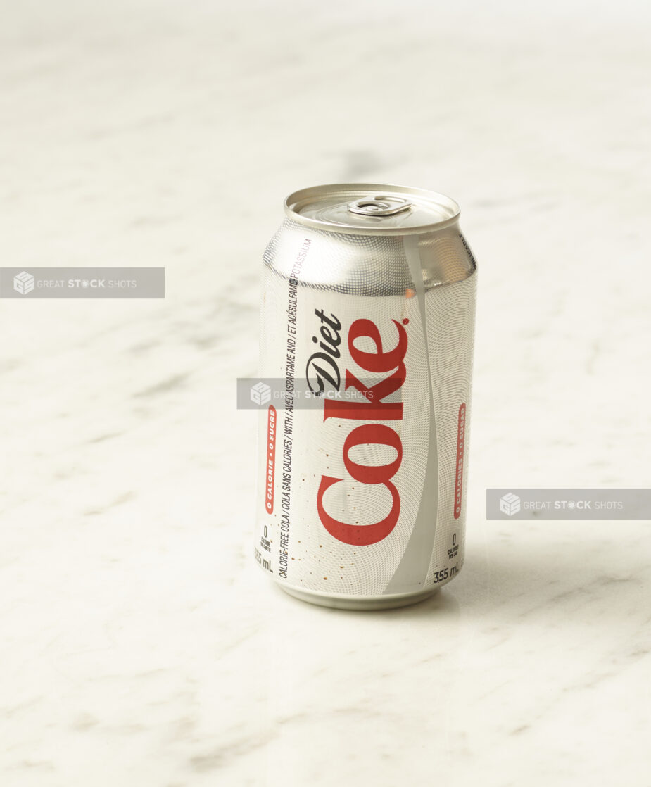 A can of Diet Coke on a marble background