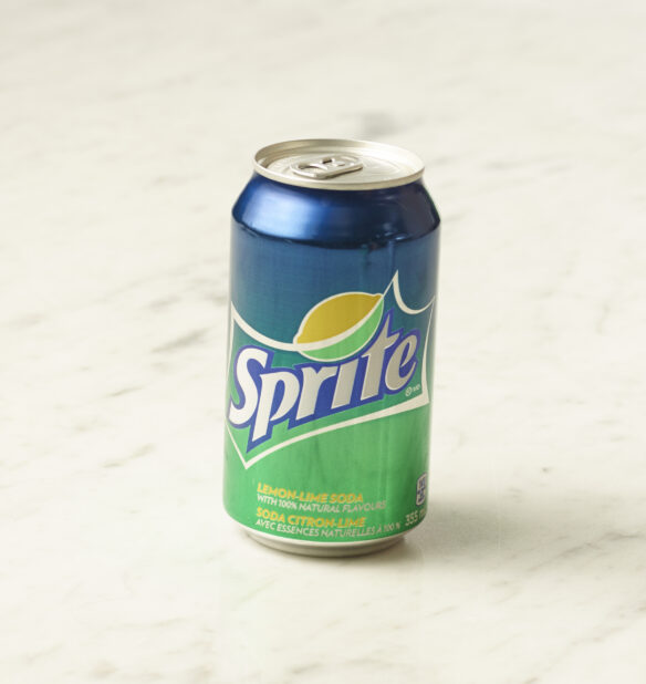 A can of Sprite on a marble background