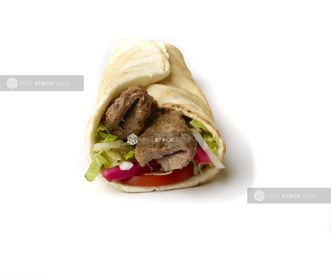 Beef Kebab Pita Wrap with Fresh Vegetable Toppings, Shot on White for Isolation