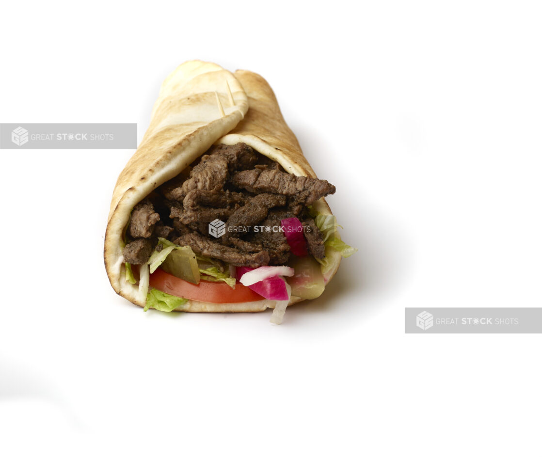 Beef Shawarma Pita Wrap with Fresh Vegetable Toppings, Shot on White for Isolation