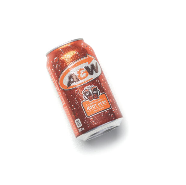 Can of A&W root beer, on an angle, on a white background