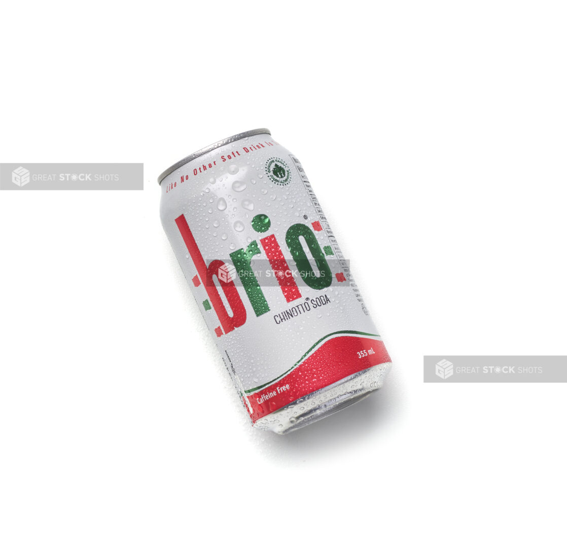 Can of Brio, chinotto soda, on an angle on a white background