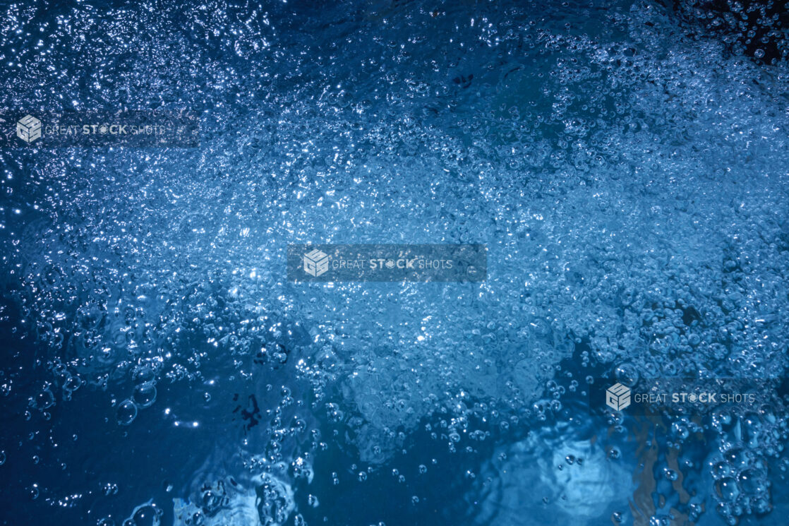 Underwater Bubbles in a Pool