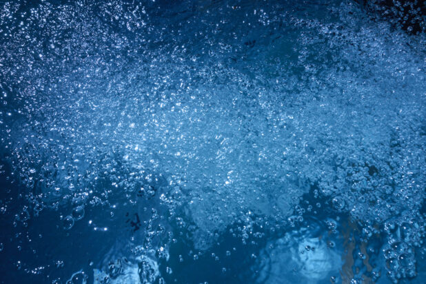 Underwater Bubbles in a Pool