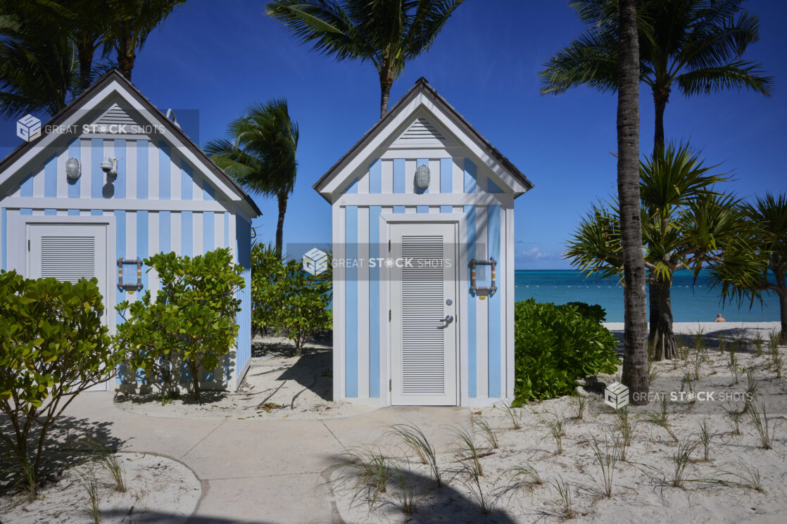 Blue and White Painted Outdoor Huts for Change Rooms and Bathrooms on a Sandy Beach in a Resort in Nassau, Bahamas
