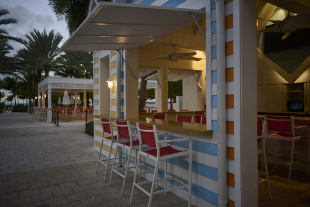 Colourfully Painted Poolside Cabanas, Kiosks and Bars at Dusk on a Hotel Resort in Nassau, Bahamas - Variation