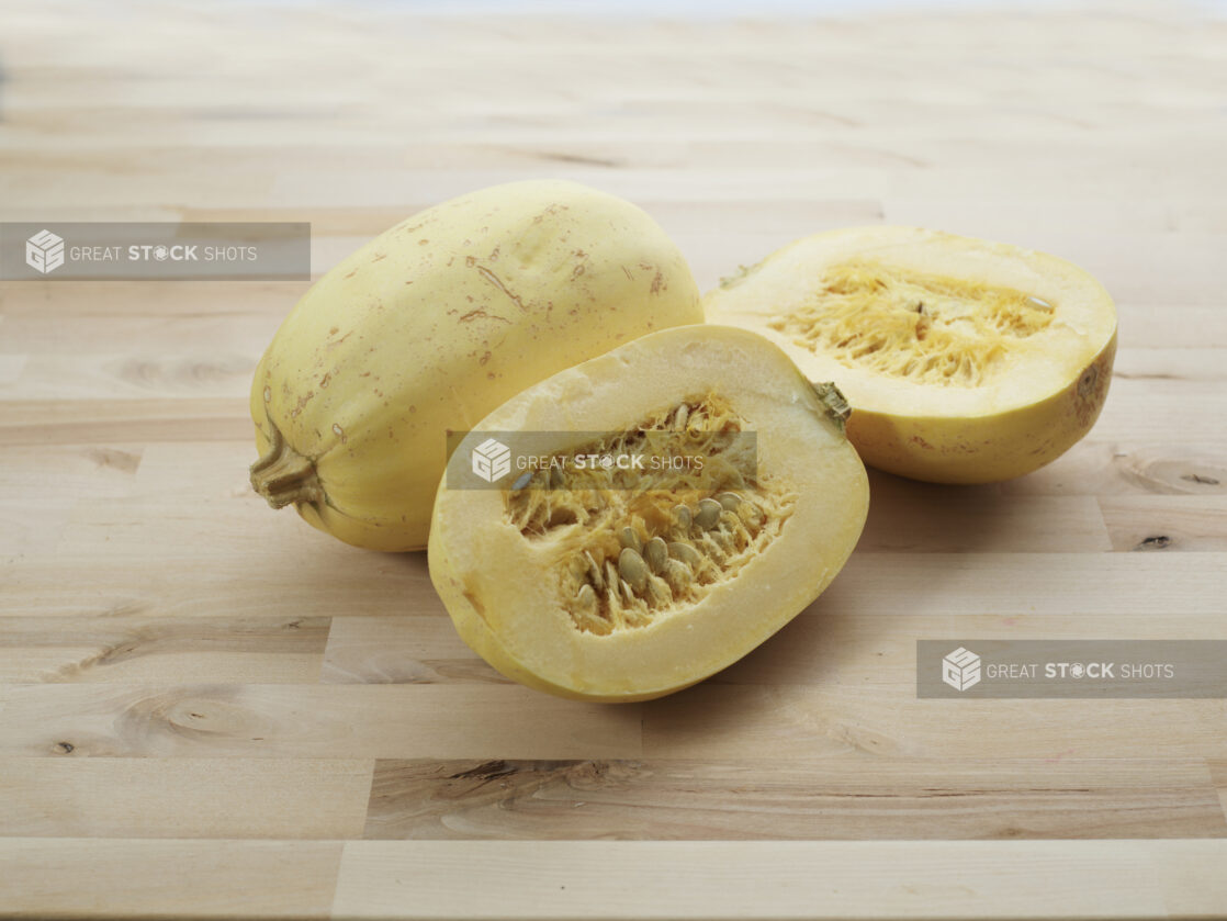 Winter squash, halved and whole, close-up