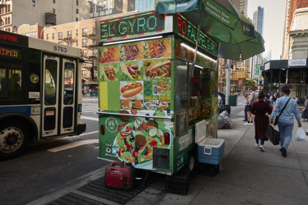 Gyro and Falafel Food Cart on a Busy Manhattan, New York Street