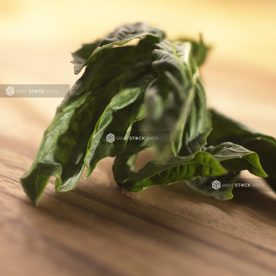 Close Up Shot of Fresh Spinach Leaves on a Wooden Board