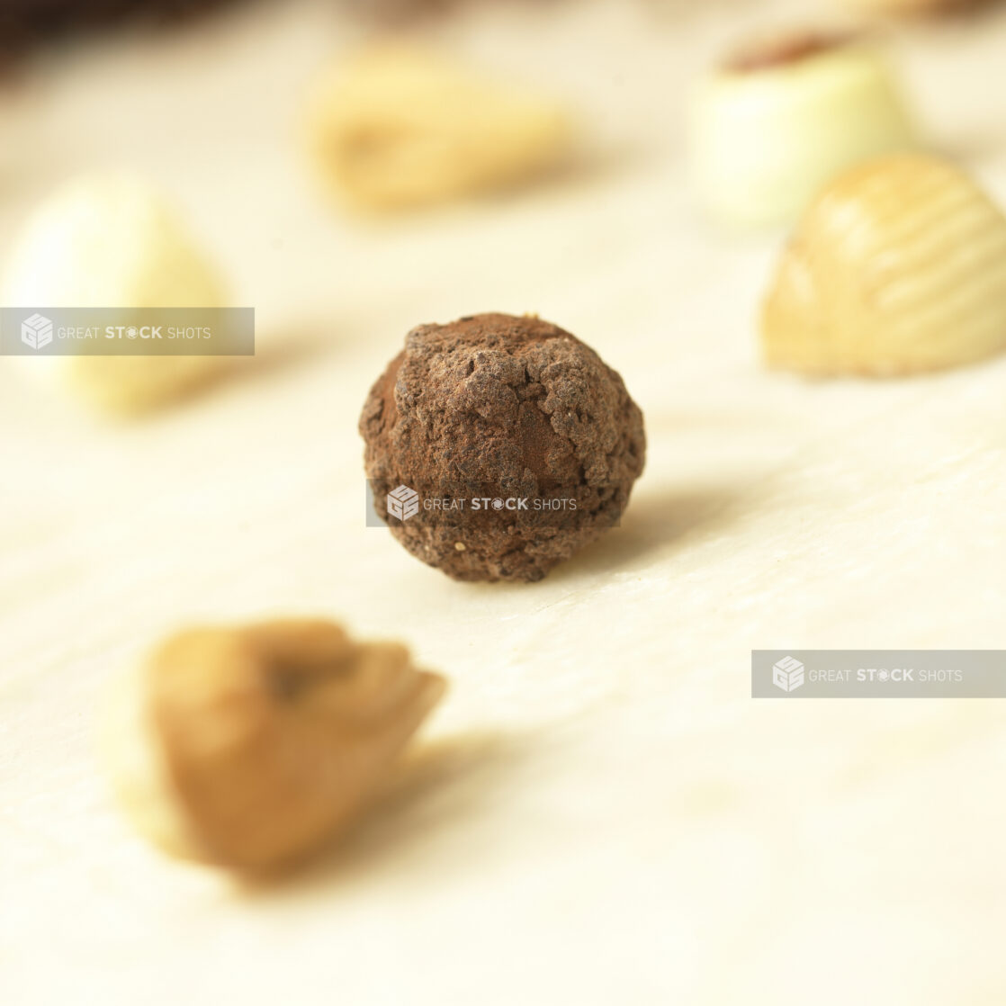 Close Up of a Chocolate Truffle Ball in an Indoor Setting