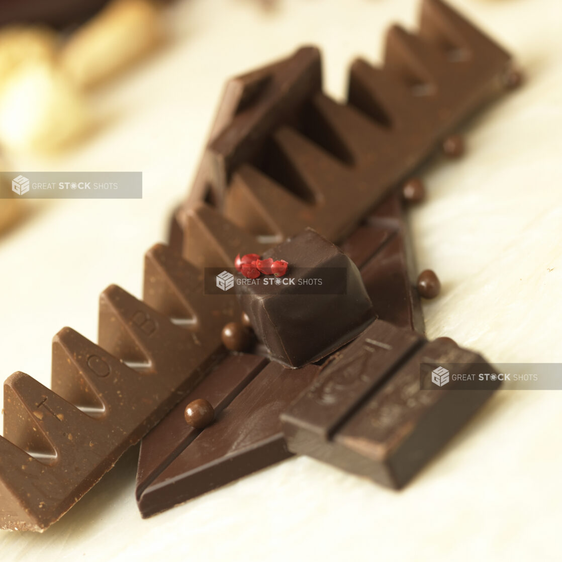 Close Up of Assorted Chocolate Bars, Squares and Truffles in an Indoor Setting