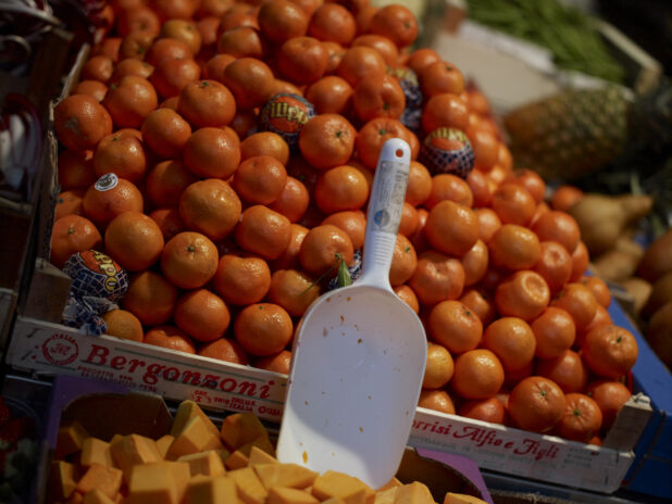 Crates of Fresh Tangerines at an Outdoor Food Market in Venice, Italy